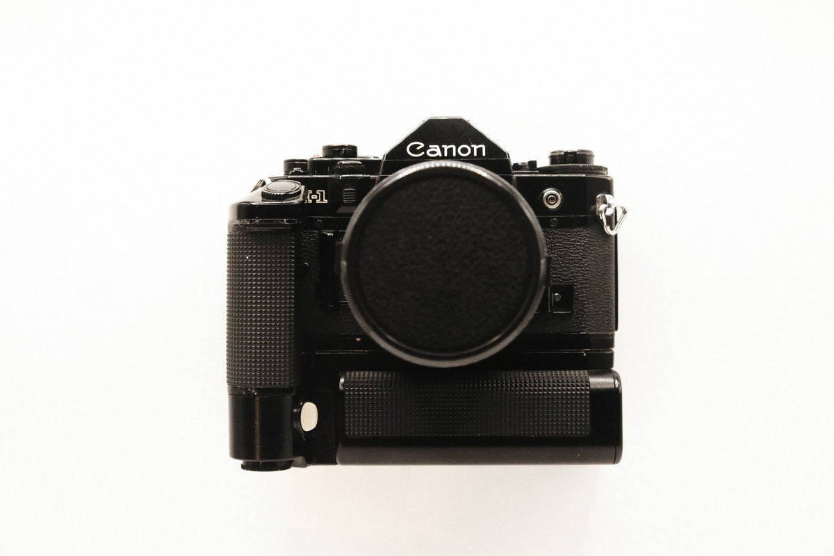 Canon A-1 + Motor Drive MA + 2 Lentes