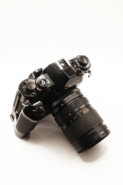 Canon A-1 + Motor Drive MA + 2 Lentes