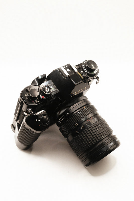 Canon A-1 + Motor Drive MA + 2 Lentes