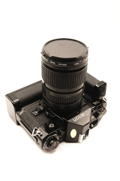 Canon A-1 + Motor Drive MA + 2 Lentes
