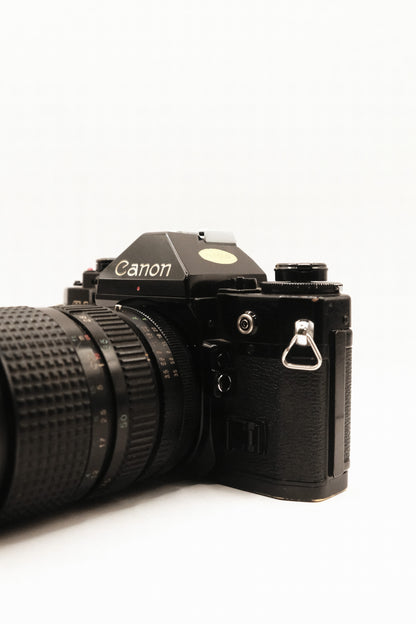 Canon A-1 + Motor Drive MA + 2 Lentes
