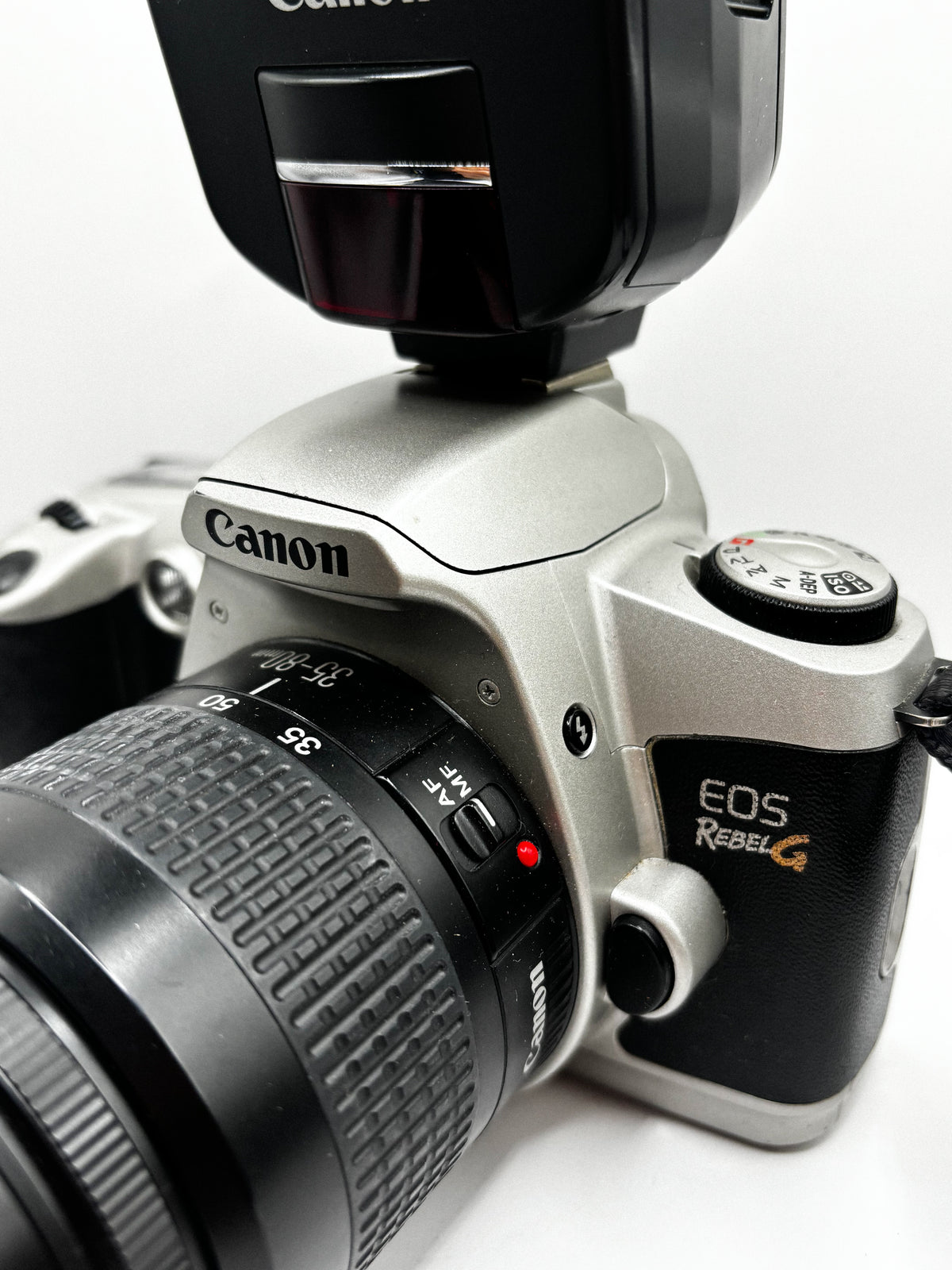 Canon EOS Rebel G + Flash Canon Speedlite 220EX