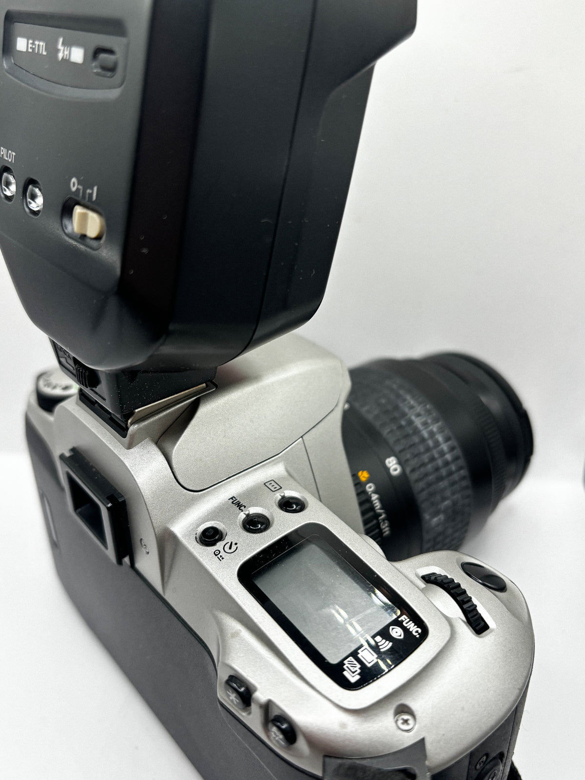 Canon EOS Rebel G + Flash Canon Speedlite 220EX
